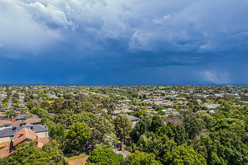 Aerial view severe thunderstorm over Melbourne Eastern Suburbs, on Tuesday Feb 13, 2024. This severe storm caused havoc in the city and surrounding suburbs and nearby regions with widespread damage to the power network causing extensive blackouts. It really was the calm before the storm with the sun shining prior to the storm lashing the suburbs.