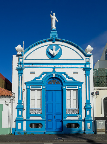 Blue contoured facade of the Império do Divino Espirito Santo dos Inocentes da Guarita, Angra do Heroismo, Terceira Island
