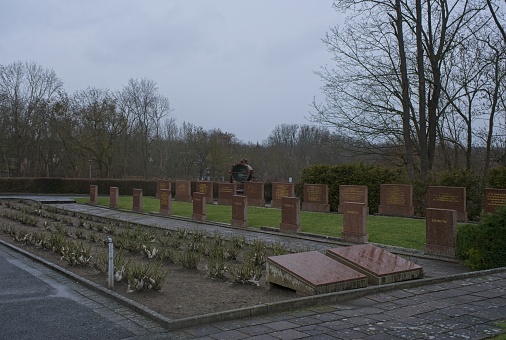 Seelow, Germany - Feb 2, 2024: This Red Army war cemetery contains the graves of 198 Soviet soldiers who were killed in 1945 during Second World War. Cloudy winter day. Selective focus