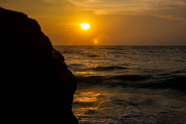 Sunrise on the beach in Colombo, Sri Lanka.