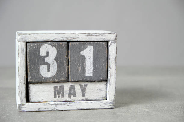 istock May 31 calendar made wooden cubes gray background.With an empty space for your text. 2017753890