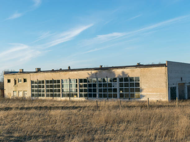 istock Abandoned building in an overgrown field 2017762690