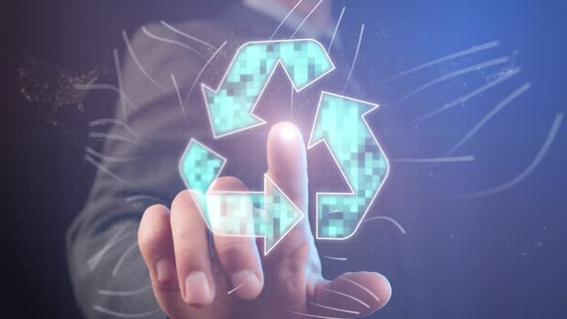 Cg footage about recycling. Against the background of a businessman, there is a luminous dot on his hand, around which there is a symbol of recycling, from which wave-like lines diverge