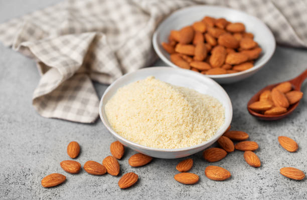 istock Fresh almond flour in a  bowl and almonds 2017765456