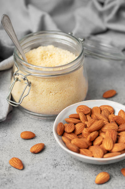 istock Fresh almond flour in a  glass jar and almonds 2017765463