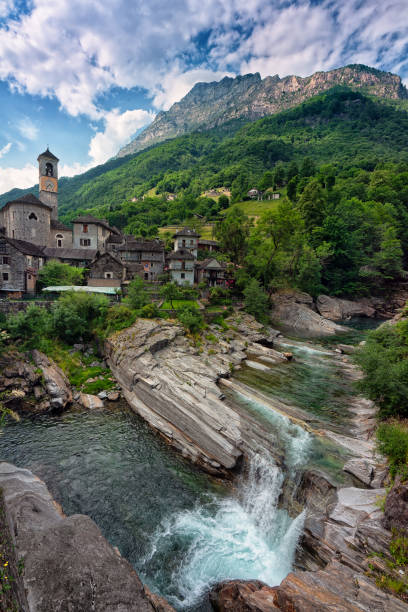 View of a small waterfall in the rural and green Val Verzasca, in the canton of Ticino in the Swiss Alps.