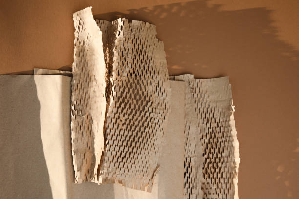 istock Packaging of eco-materials. Packaging paper on a brown background. Concept saving the planet from undetectable debris 2017810809
