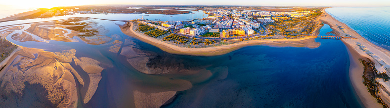 Isla Cristina drone aerial view in Huelva of Andalusia Spain at sunset skyline