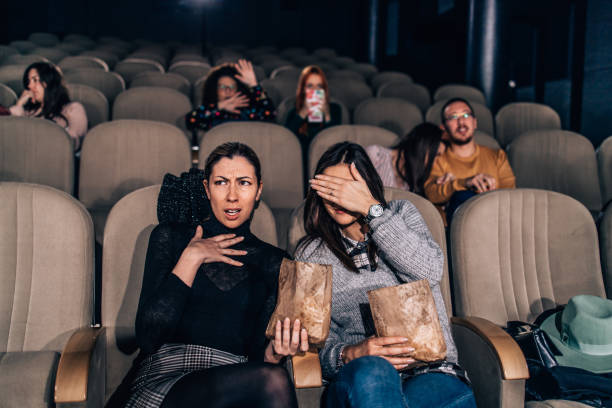 istock Group of people watching scary movie 2017826358