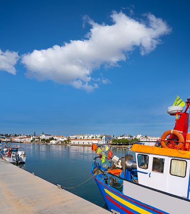 Tavira skyline and Gilao in Portugal Algarve and boats harbor