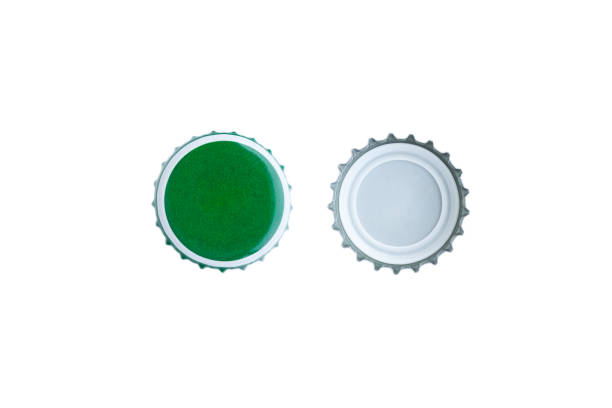 istock Green bottle caps isolated on white background, Top view 2017826910