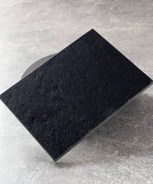 istock black  sample marble tiles on gray stone countertop 2017828686