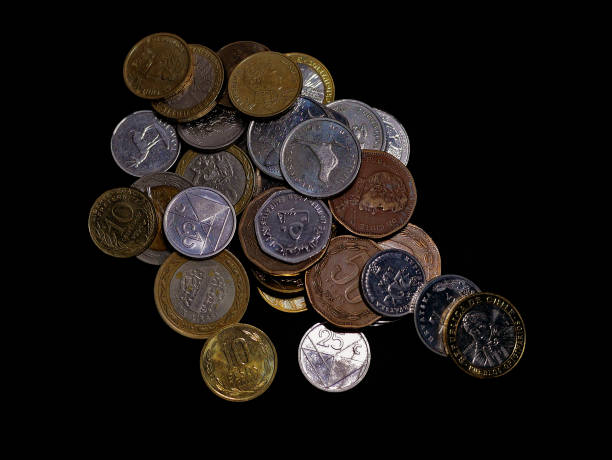 istock Coins of different countries on a black background 2017828782