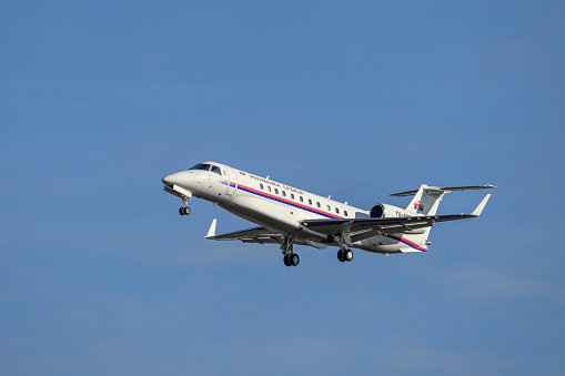 Munich, Germany - February 16. 2024 : 
Republic of Serbia Embraer EMB-135BJ Legacy 
with the aircraft registration YU-SRB 
lands as part of the Munich Security Conference 2024,
on the south runway 26L of Munich Airport MUC