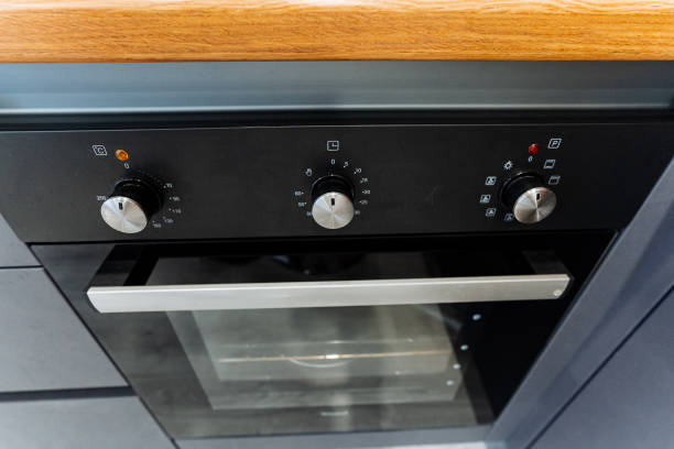 istock A black oven sits on a wooden counter in a kitchen 2017935280