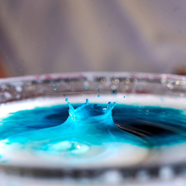 spraying abstract acrylic paint
