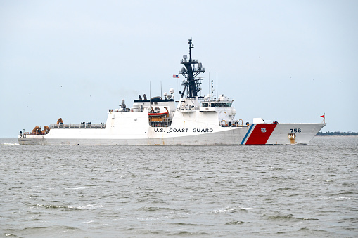 Charleston, SC, USA - February 17, 2024: Stone, a 140-meter U.S. Coast Guard national security cutter with advanced technological capabilities, sails into Charleston Harbor.
