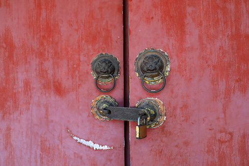 Closed red doors and locks