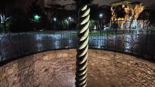 Burmese Column on the streets of historic Istanbul at night,
snake column