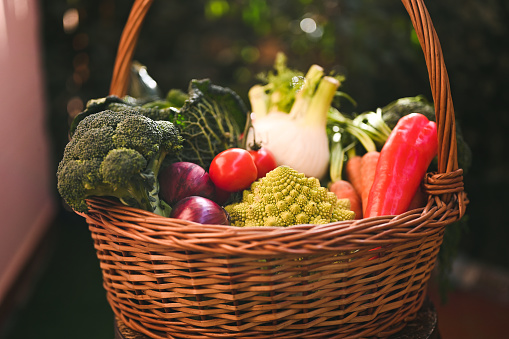 Wicker basket of autumn vegetables.