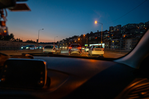 car at red light at night