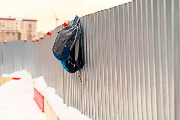 Backpack Standing Vertically On White Background