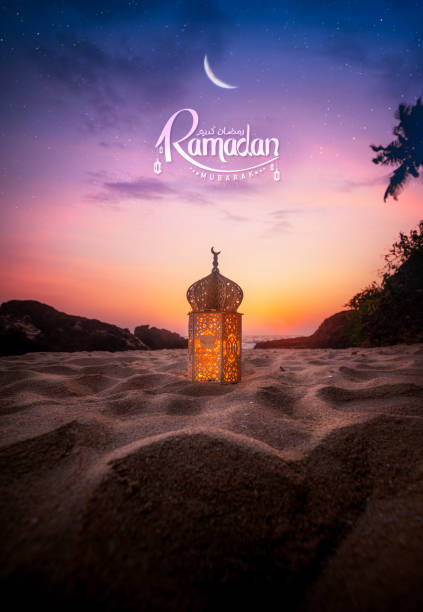 istock Beautiful lantern lamp on the beach with crescent moon 2018100308