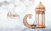 Iftar concept greeting image Moroccan lantern lamp with dates and crescent moon