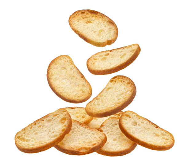 istock Falling bruschetta crackers, bread croutons isolated on white background 2018254693