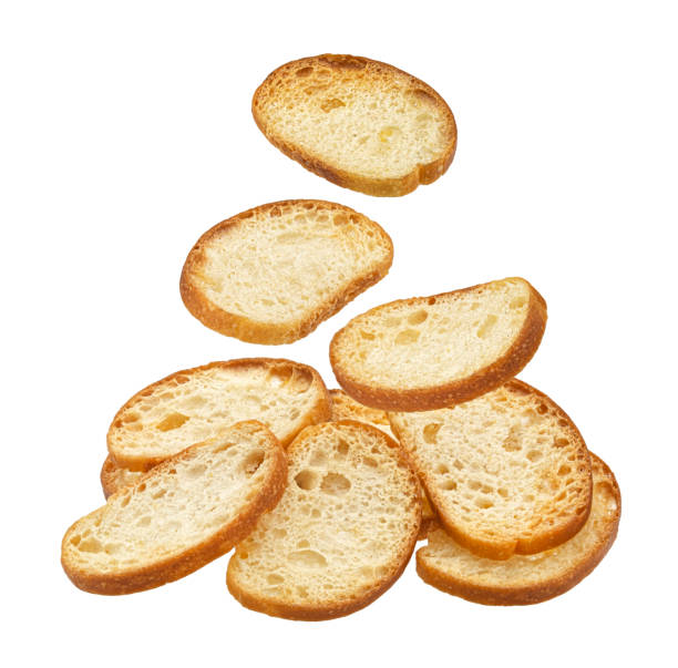 istock Falling bruschetta crackers, round bread croutons isolated on white background 2018254697