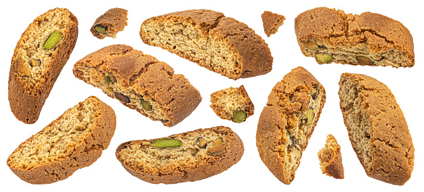 Cantuccini biscuits, Italian almond cookies with pistachio nuts isolated on white background, full depth of field