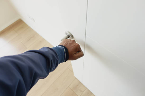 istock Man's Hand Opening door close up 2018308292