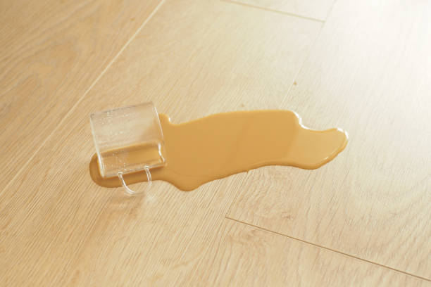 istock cup of coffee spilled on floor 2018320742