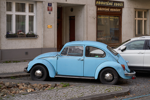 Prague, Czech Republic: Nov 08 2022 - Vintage light blue Volkswagen VW Beetle car Volkswagen Type 1 aka Volkswagen Bug released circa 1960 in Germany parked on the street.