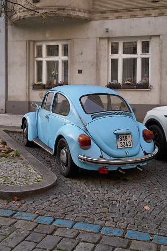 Prague, Czech Republic: Nov 08 2022 - Vintage light blue Volkswagen VW Beetle car Volkswagen Type 1 aka Volkswagen Bug released circa 1960 in Germany parked on the street.