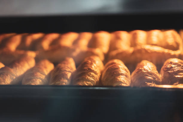 istock Croissant baking in the oven 2018346786