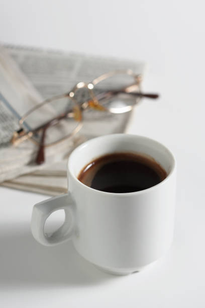 istock Coffee, newspaper and glasses 2018364312