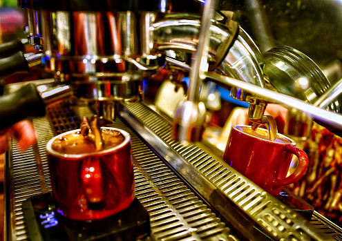 Jakarta, Indonesia. Espresso pour at Giyanti Coffee Roastery