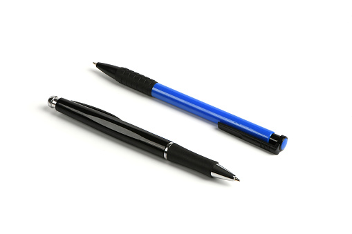 Business blue and black automatic ballpoint pen isolated on white. High resolution photo. Full depth of field.