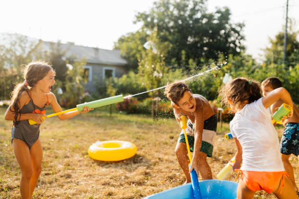istock Water fight in our Backyard 2018460990