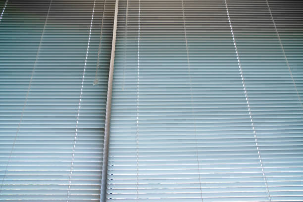 close up on window blind curtain in office room