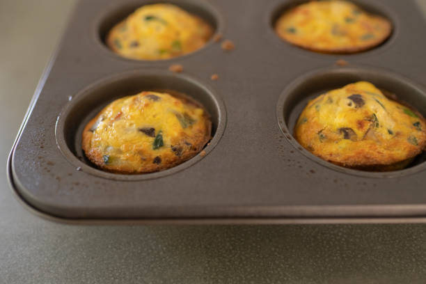 istock Close up fresh from the oven, egg and vegetable frittata muffins in a pan 2018571435