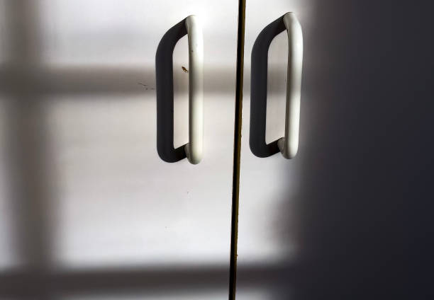 Door handles in early morning light