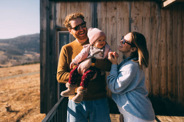 Happy Family Enjoying Sunny Day Outdoors Together