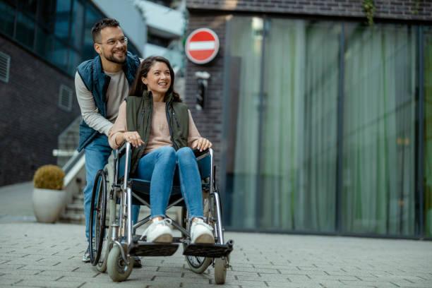 istock Disabled Couple Outdoors 2018649425