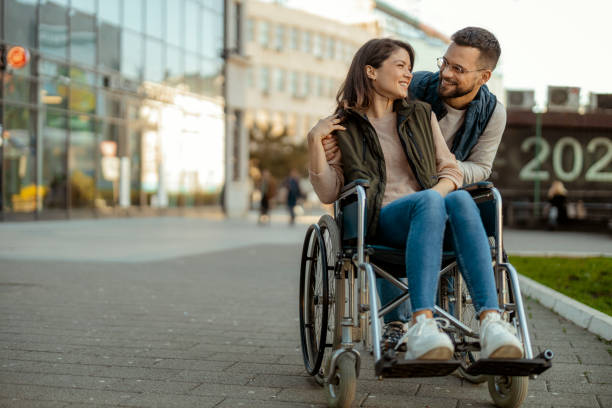 istock Romantic Relationships Between Handicapped Couple Outdoors 2018654558