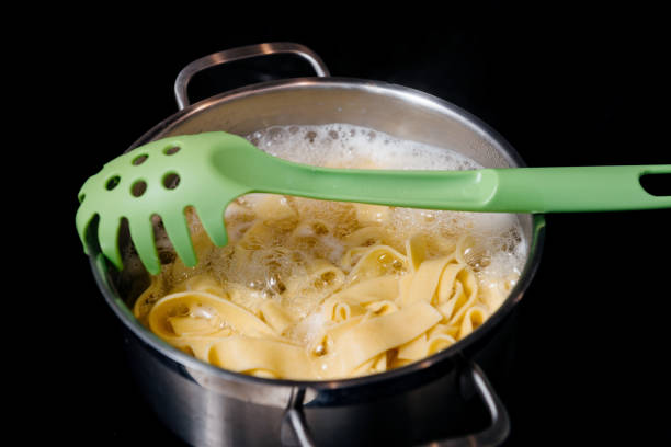 istock pasta in pot on the induction hob 2018704355
