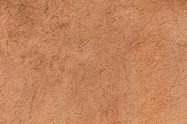 istock background of brown painted plaster wall 2018781593