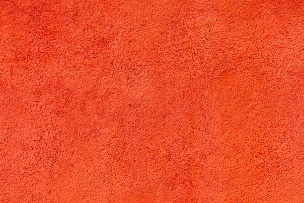 istock background of red painted plaster wall 2018783128