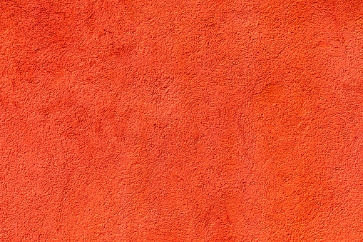 background of red  painted plaster wall in bright color